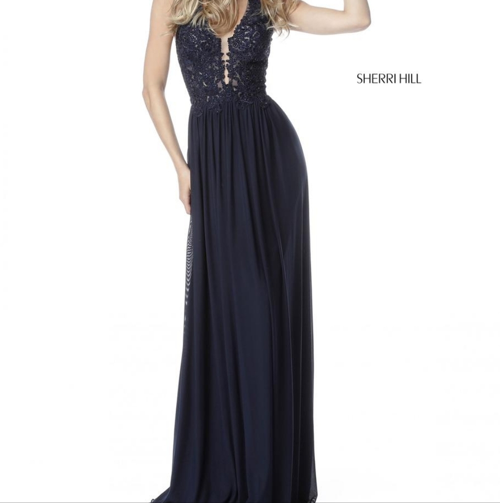Size 00 black with nude underlay Sherri Hill NWT gown with lace applique bodice.